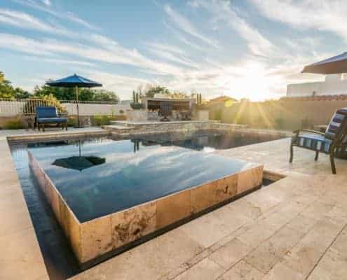 biltmore luxury pool perimeter overflow spa and fireplace 2